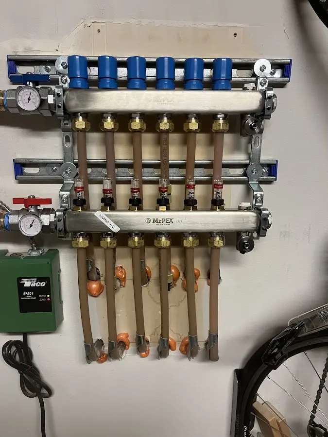 Plumber performing Water Heater Repair at a residential property in Warrington