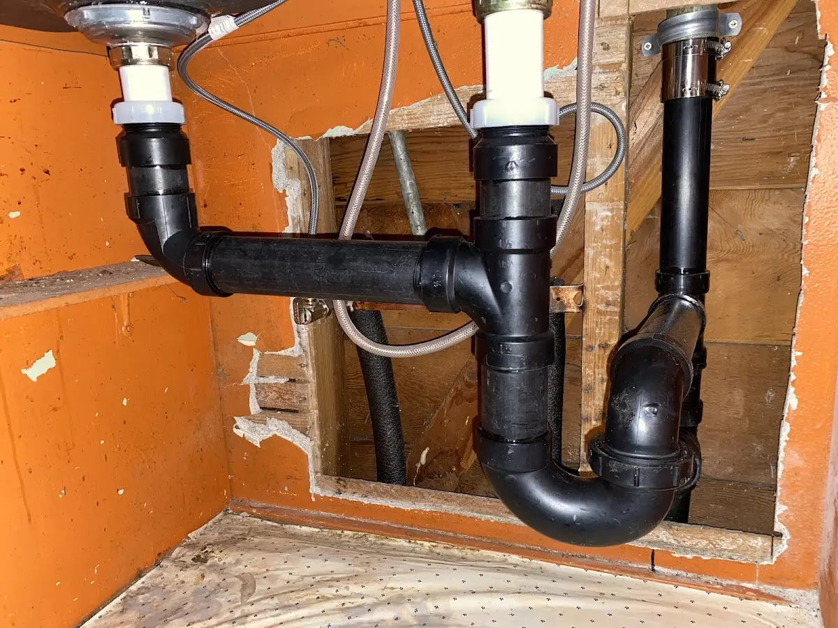 Professional Garbage Disposal Repair equipment and tools on the job in Warrington